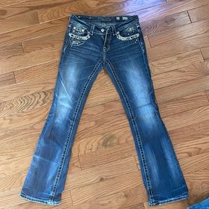 Miss Me size 27 signature rise boot cut jean. Regular length